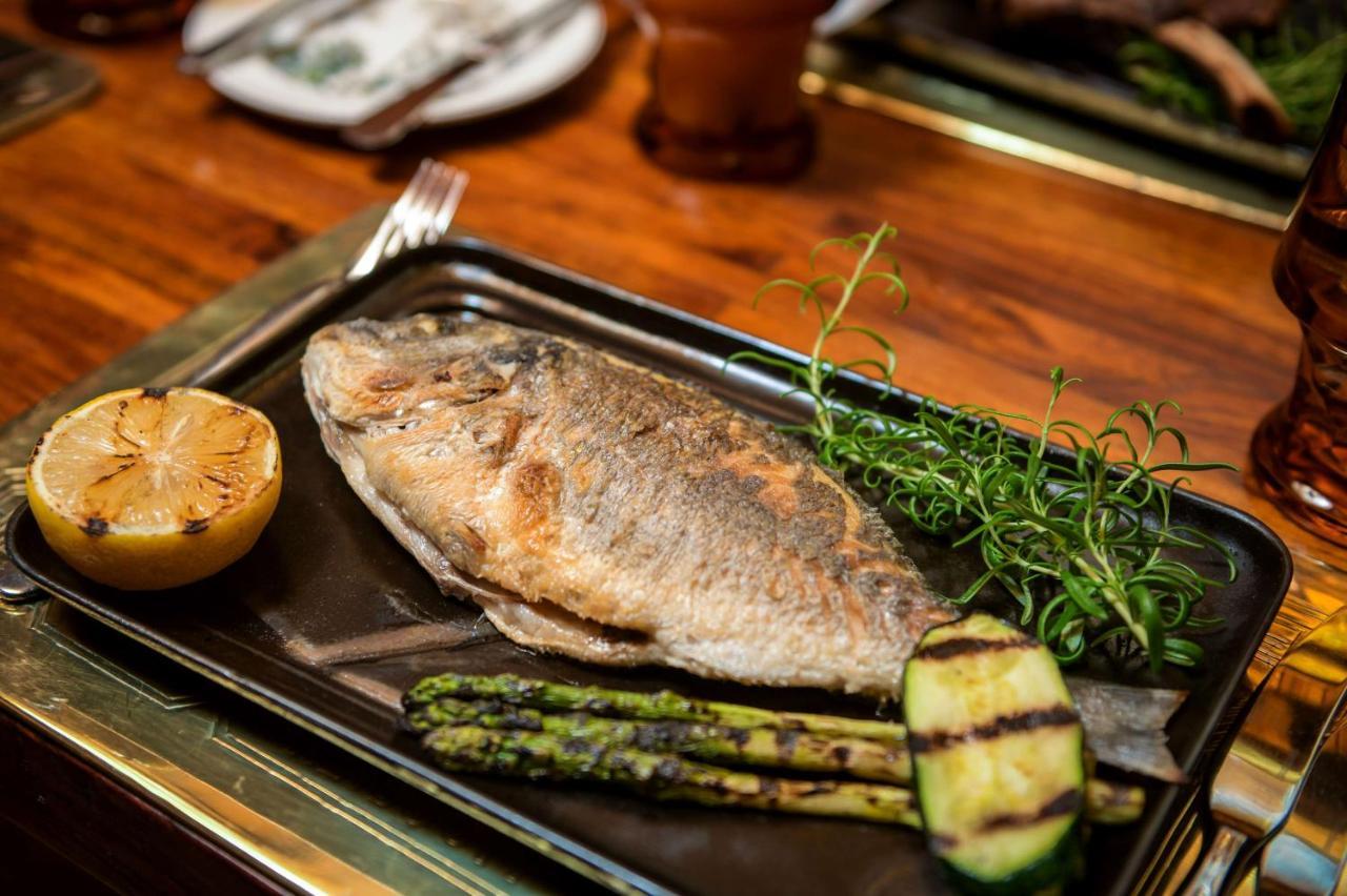 Radisson Blu Hotel, Kuwait Кувейт Экстерьер фото Grilled turbot